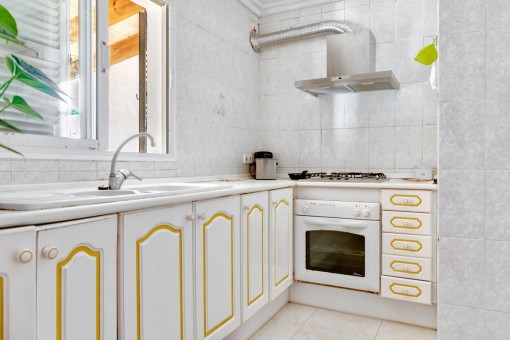 Bright and fully equipped kitchen