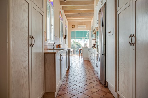 Light-flooded kitchen with terrace access