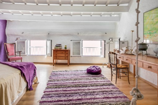 Cosy bedroom with sloping roof