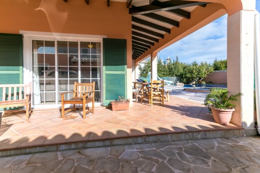 Covered terrace with seating area