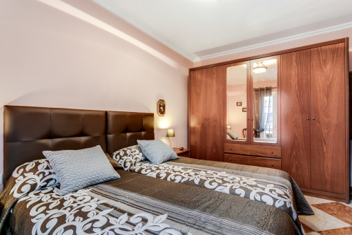 Master bedroom with built-in wardrobe