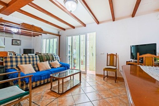 Living and dining area with patio access
