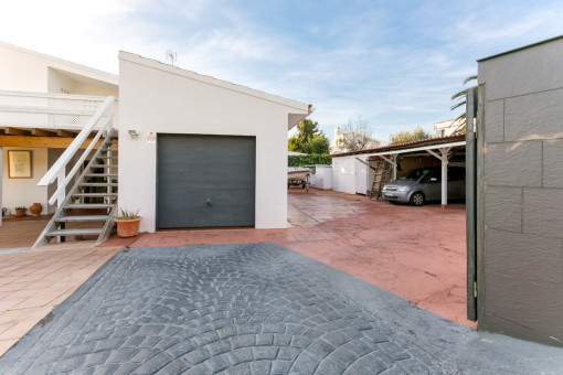 Backyard with ample space for cars