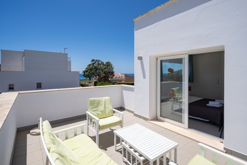 Sunny terrace with seating area