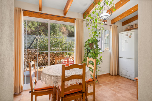 Bright dining area with terrace access