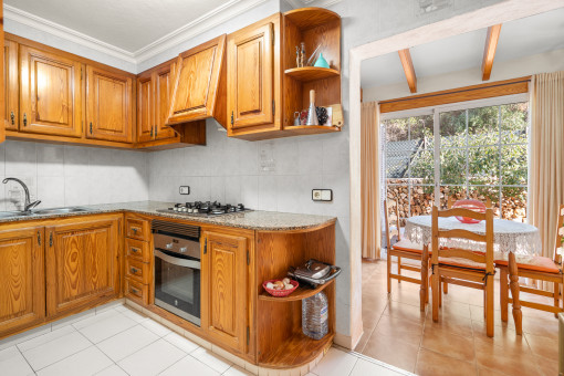 Wooden kitchen with separate dining area