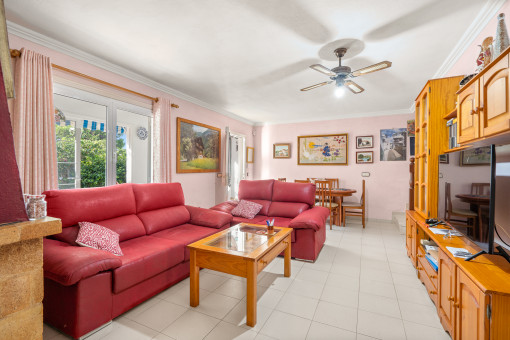 Living and dining area with terrace access