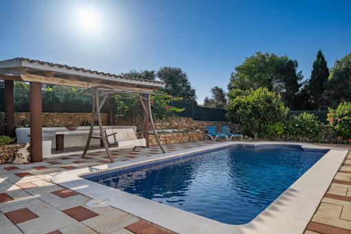 Beautiful pool area with seating area 