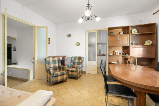 Living and dining area with kitchen access
