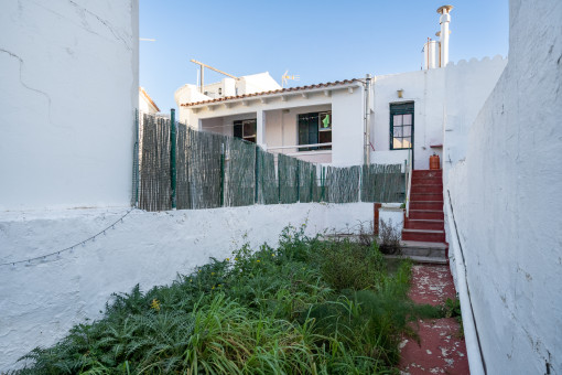 Stairs lead to the patio / garden